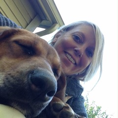 Elizabeth Barron posing for a selfie with her dog