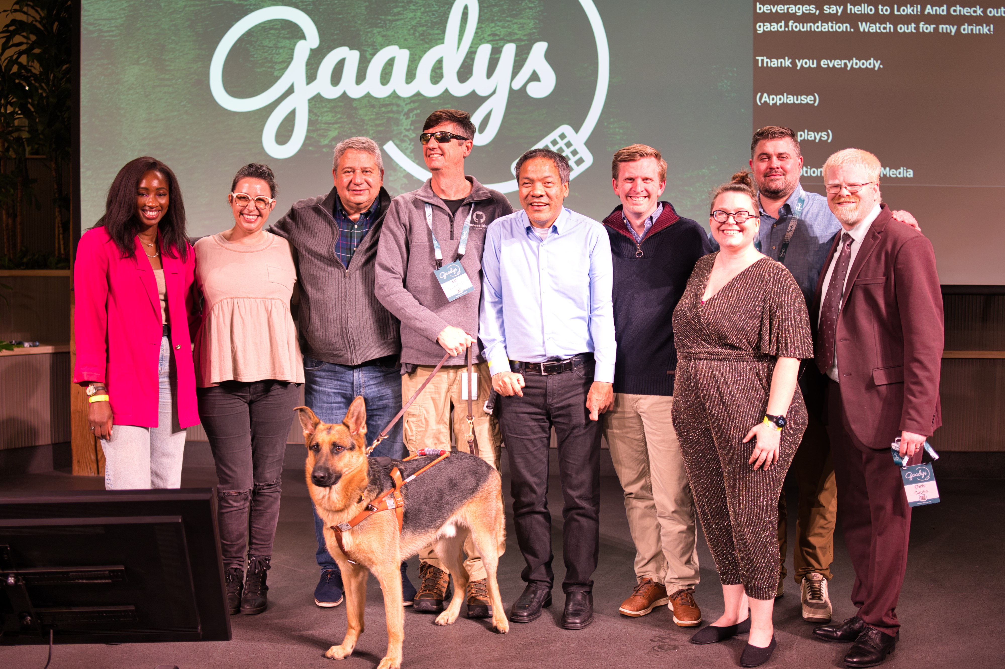 GAAD Foundation directors with Ed Summers of GitHub posing on the GitHub stage at the 2024 Gaady Awards.