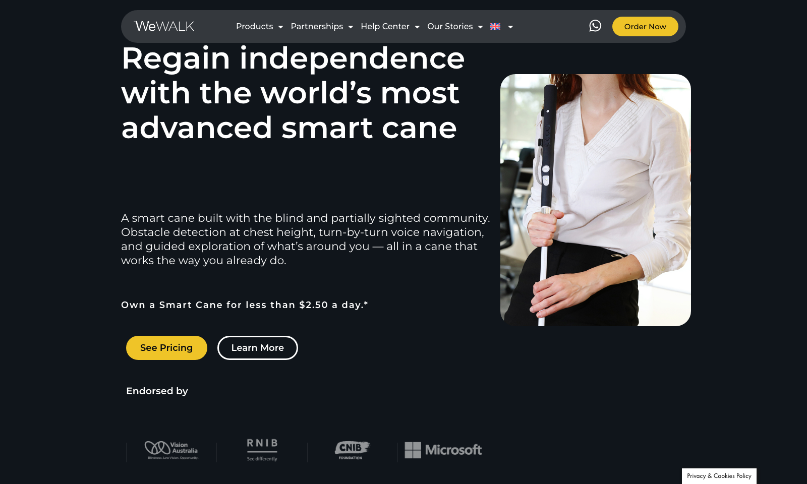 WeWALK website homepage showing a woman holding the WeWALK Smart Cane next to the heading 'Regain independence with the world's most advanced smart cane'